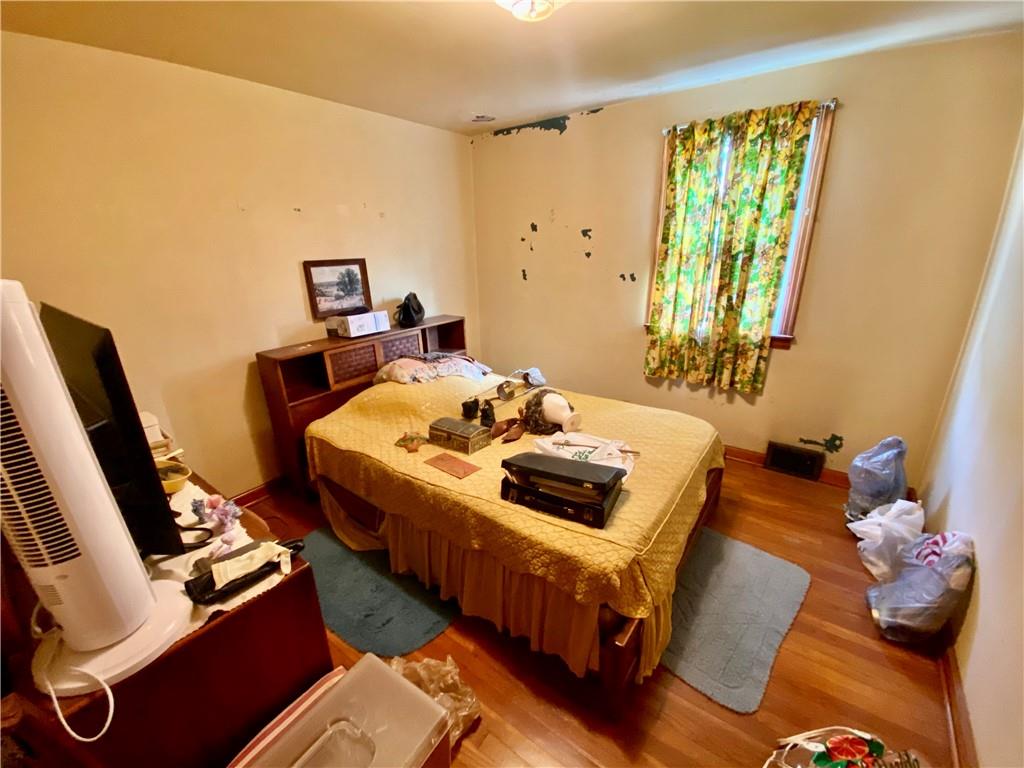 1590 Old Brodhead Road Monaca, PA 15061 - Photo 18 of 29 a bedroom with a bed and a window