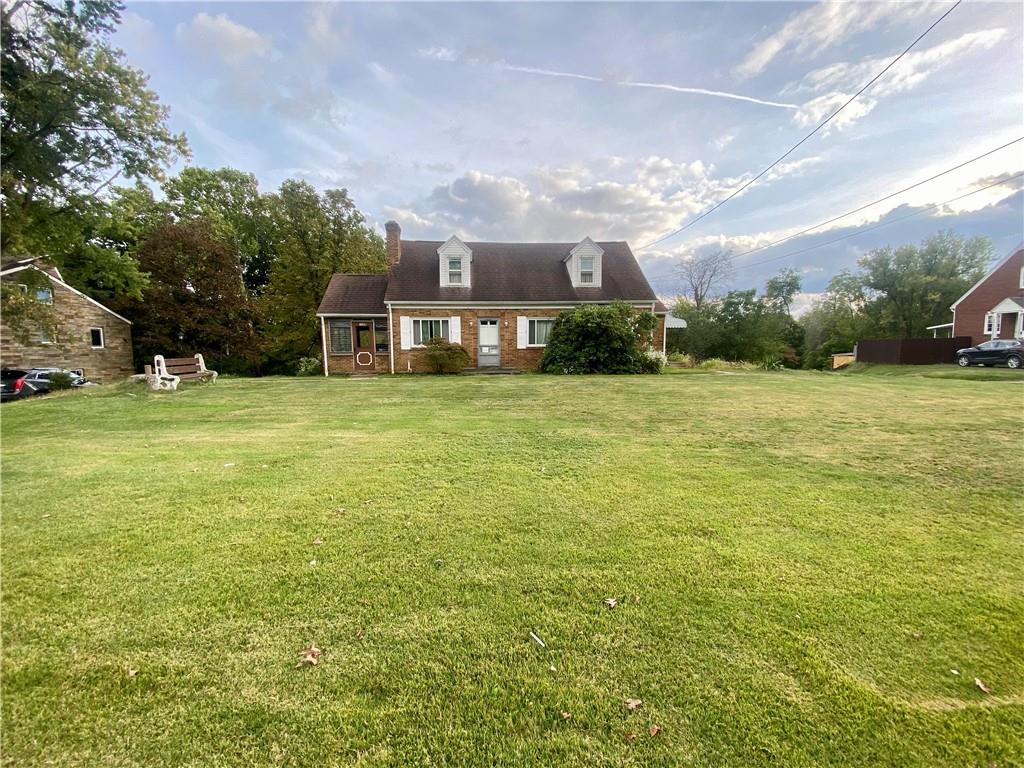 1590 Old Brodhead Road Monaca, PA 15061 - Photo 2 of 29 a view of a big yard with a house