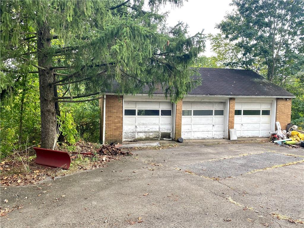 1590 Old Brodhead Road Monaca, PA 15061 - Photo 25 of 29 a view of a house with a yard and sitting area