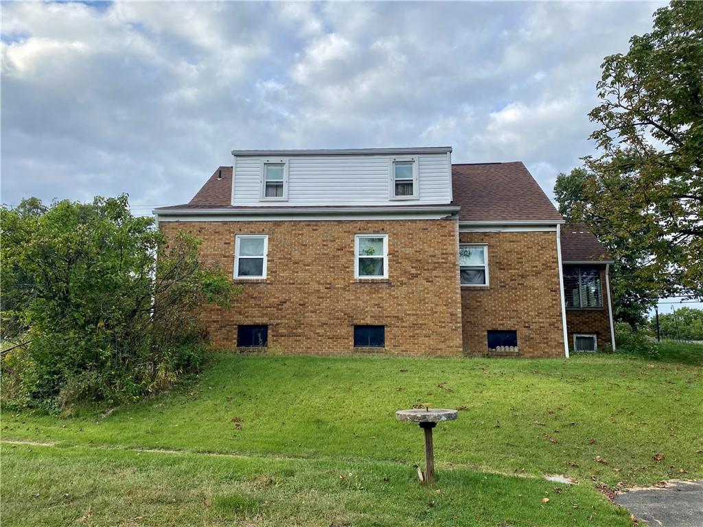 1590 Old Brodhead Road Monaca, PA 15061 - Photo 27 of 29 a front view of a house with a yard