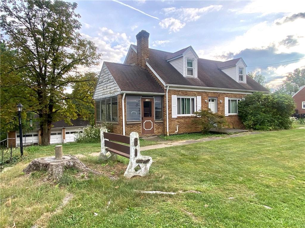 1590 Old Brodhead Road Monaca, PA 15061 - Photo 3 of 29 a front view of a house with a yard