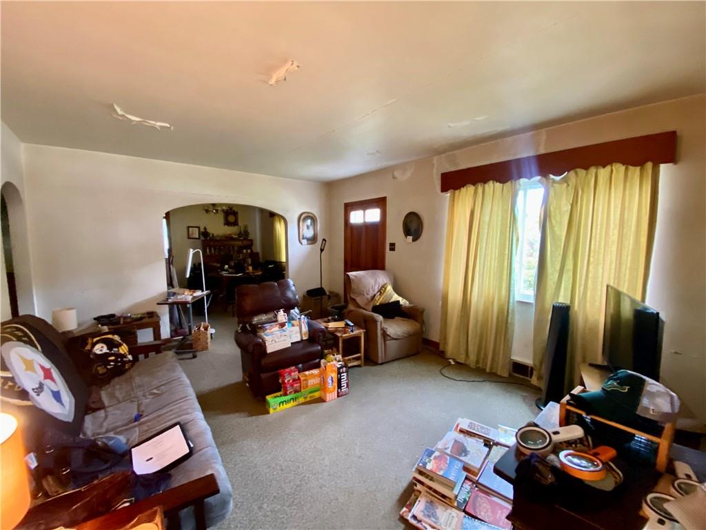 1590 Old Brodhead Road Monaca, PA 15061 - Photo 6 of 29 a living room with furniture and a flat screen tv
