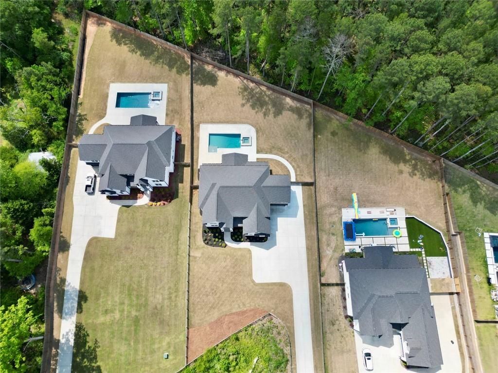 2694 Thompson Mill Road Buford, GA 30519 - Photo 10 of 70 aerial view of a house with outdoor space