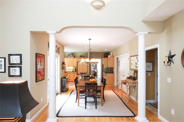 65 Lincoln Road Sudbury, MA 01776 - Photo 13 of 24 a view of a dining room with furniture and chandelier