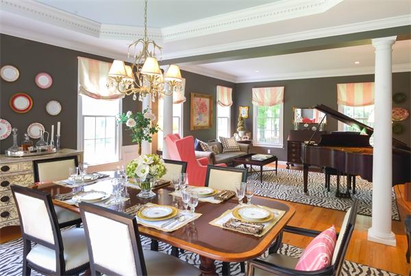 65 Lincoln Road Sudbury, MA 01776 - Photo 4 of 24 a view of a dining room with furniture large windows and wooden floor
