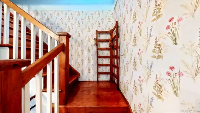 a view of entryway with stairs