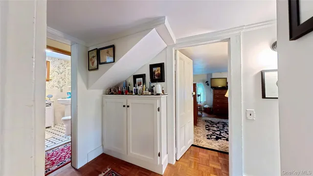 a view of livingroom with furniture and cabinet
