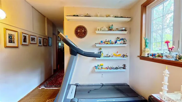 a view of washer and dryer with wooden floor