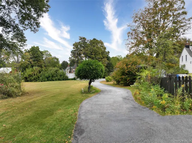 a view of a street with an outdoor space