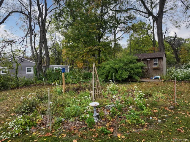 a garden view with a seating space