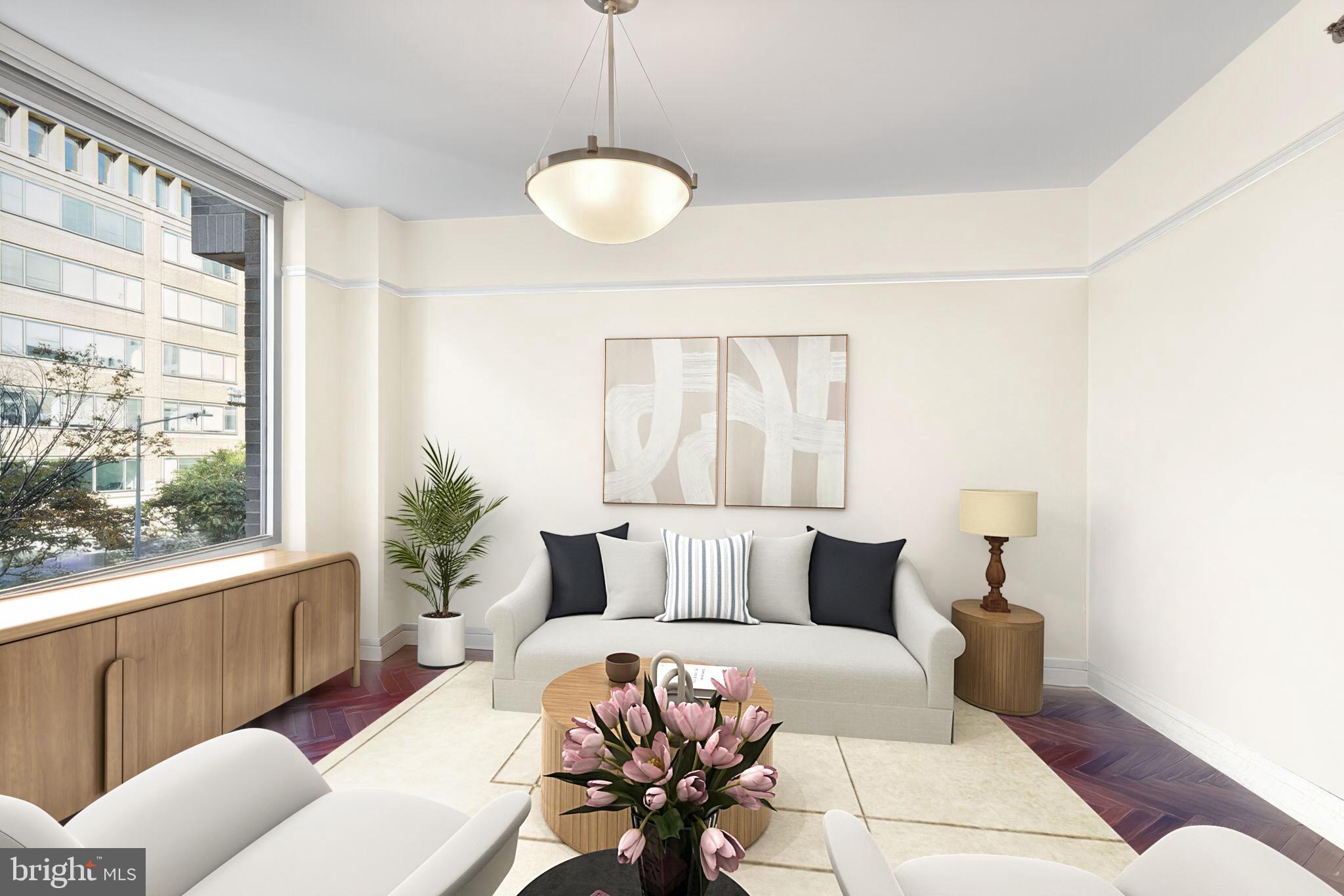 1155 23rd Street Northwest, Unit 3D Washington, DC 20037 - Photo 5 of 22 a living room with furniture and a large window