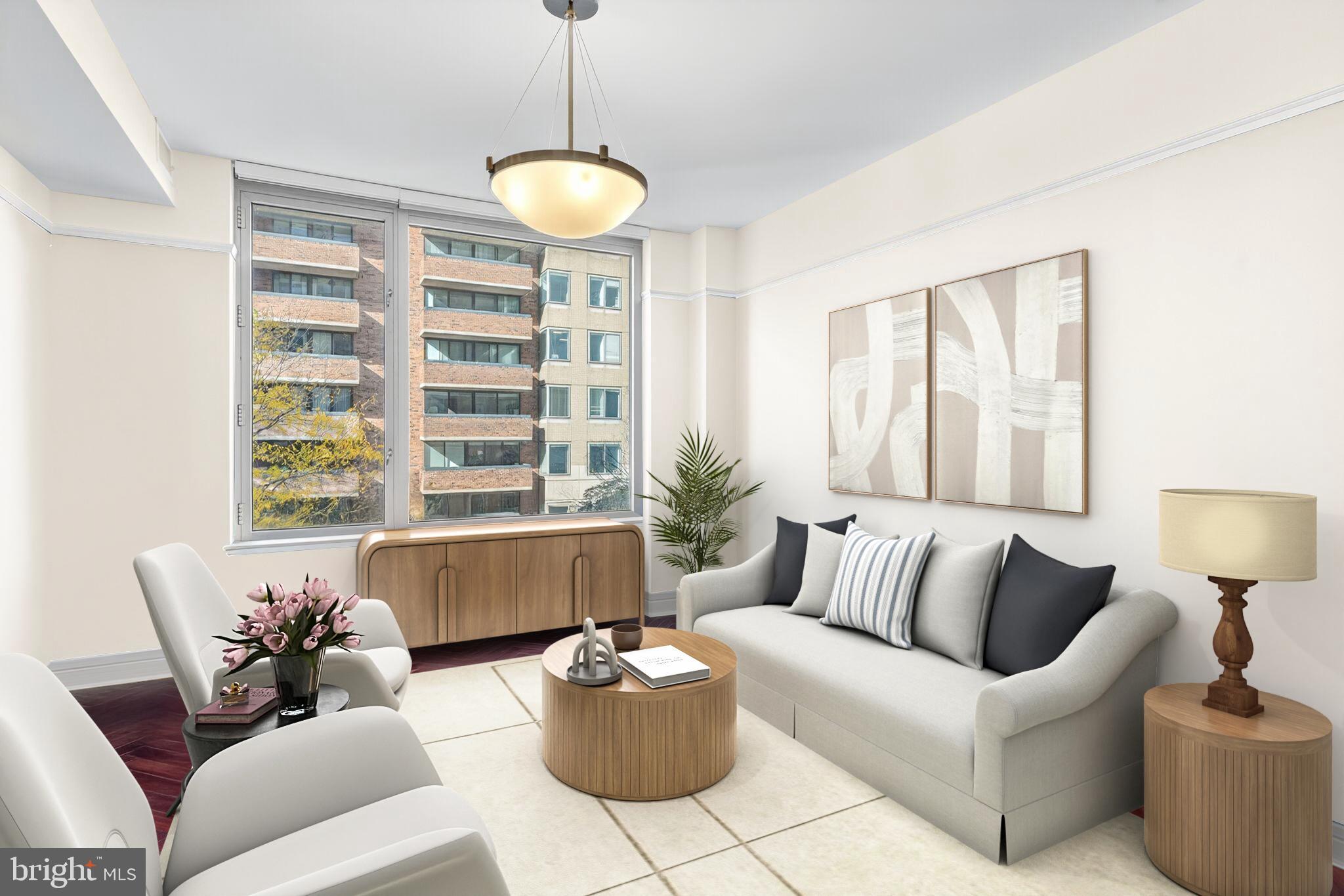 1155 23rd Street Northwest, Unit 3D Washington, DC 20037 - Photo 6 of 22 a living room with furniture and a large window