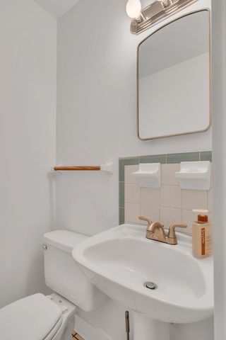 a bathroom with a sink and a toilet