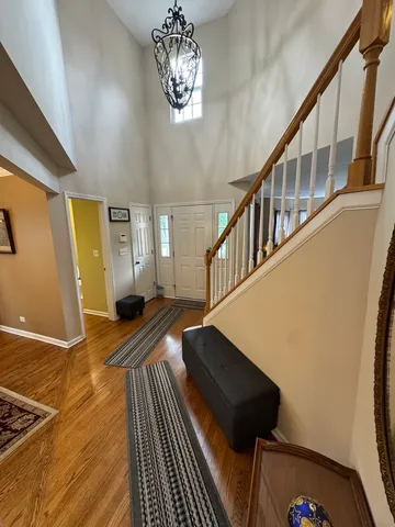 a view of a dining room with furniture and window