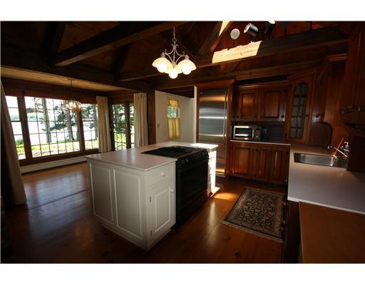 46 Albion Point Road Boothbay, ME 04537 - Photo 12 of 22 Kitchen. Raised panel cabinetry,...