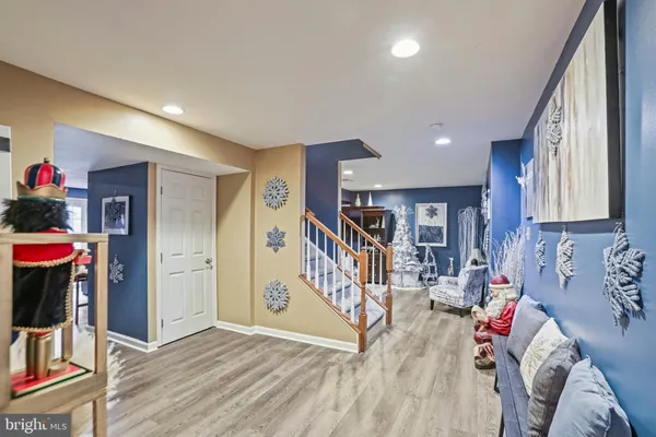 a front view of a house with a yard table and chairs