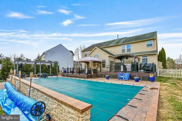 a view of outdoor space with wooden floor and outdoor seating
