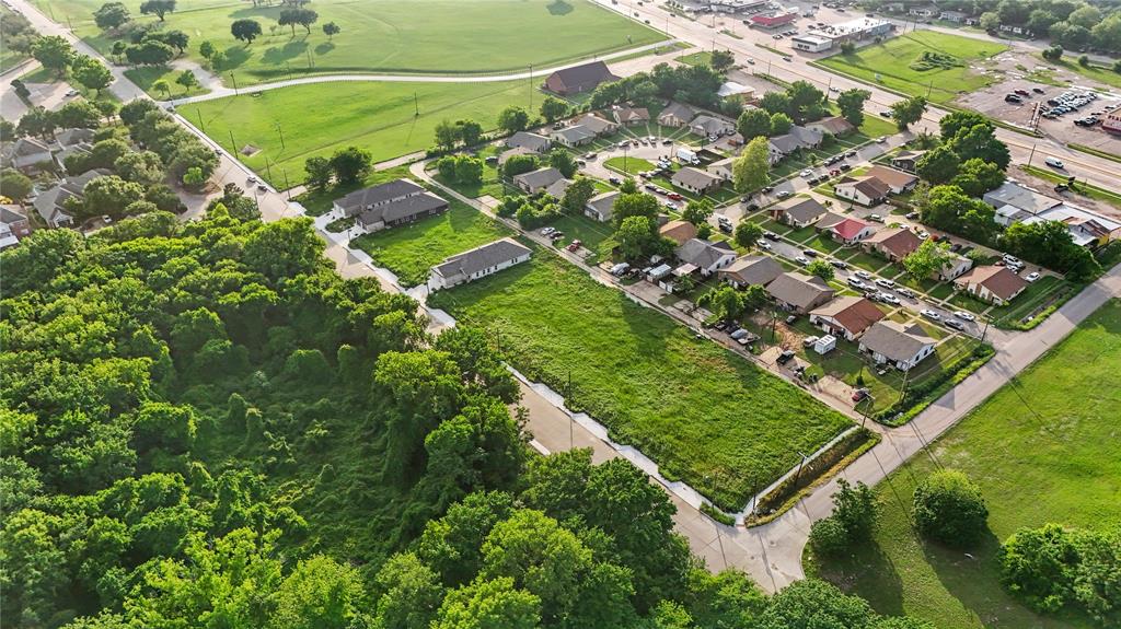 3145 Stag Road Dallas, TX 75241 - Photo 2 of 5 an aerial view of a residential houses with outdoor space and street view