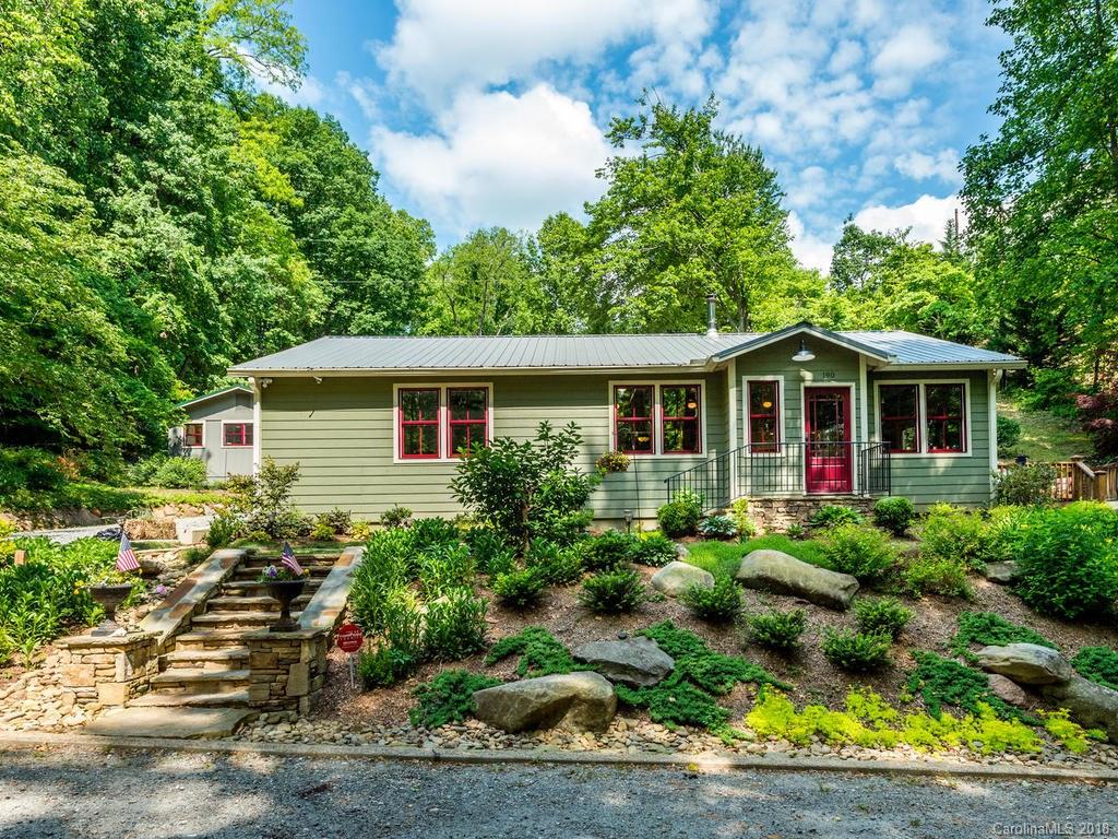 190 Euit Smith Road Tryon, NC 28782 - Photo 1 of 36 a view of front of house with a yard