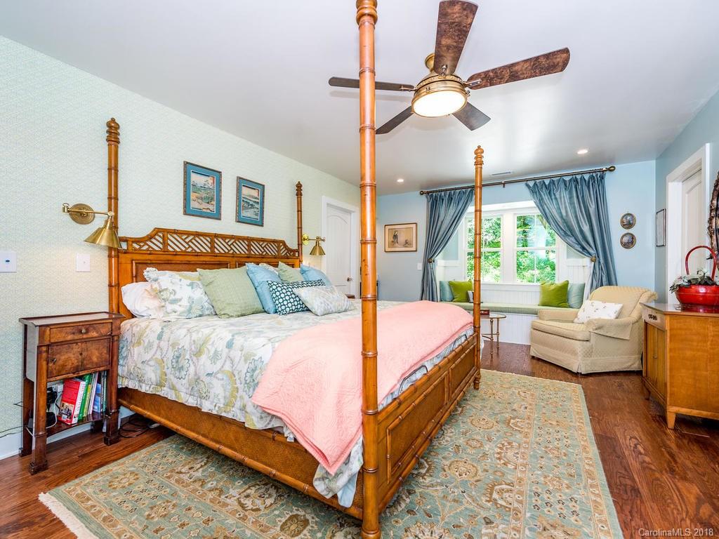 190 Euit Smith Road Tryon, NC 28782 - Photo 14 of 36 a bed room with a bed and a couch