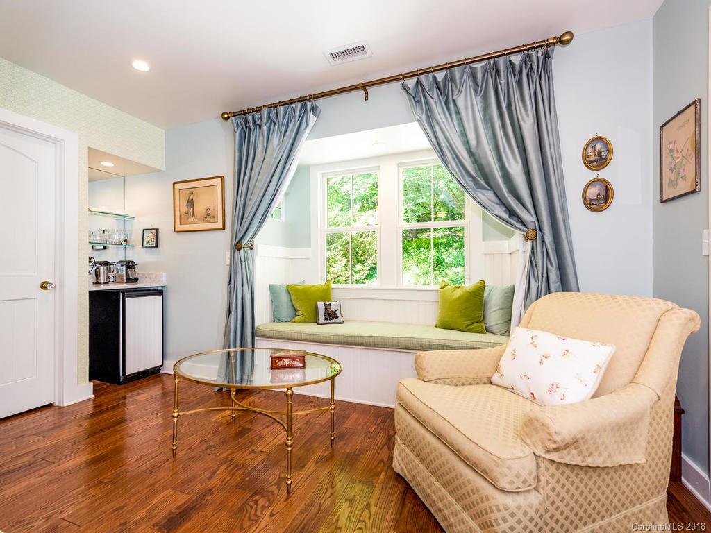 190 Euit Smith Road Tryon, NC 28782 - Photo 15 of 36 a living room with furniture and a large window