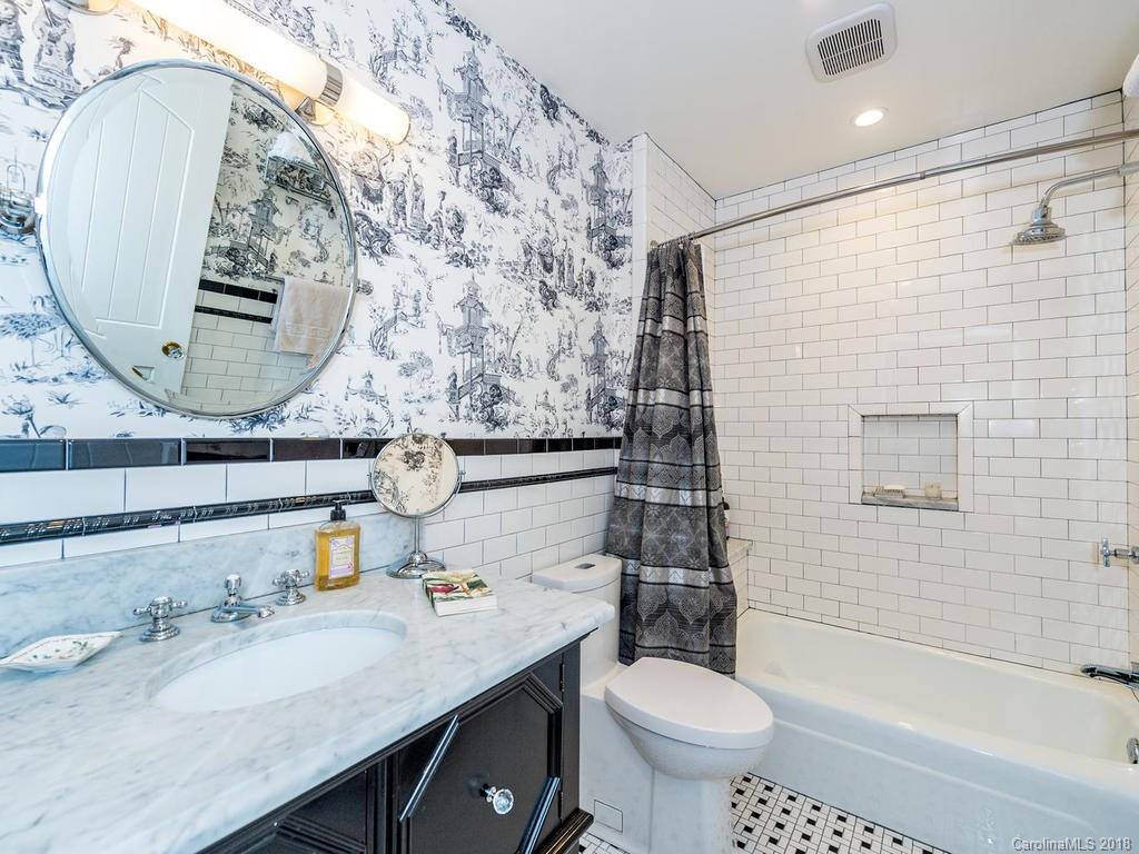190 Euit Smith Road Tryon, NC 28782 - Photo 19 of 36 a bathroom with a sink toilet and shower