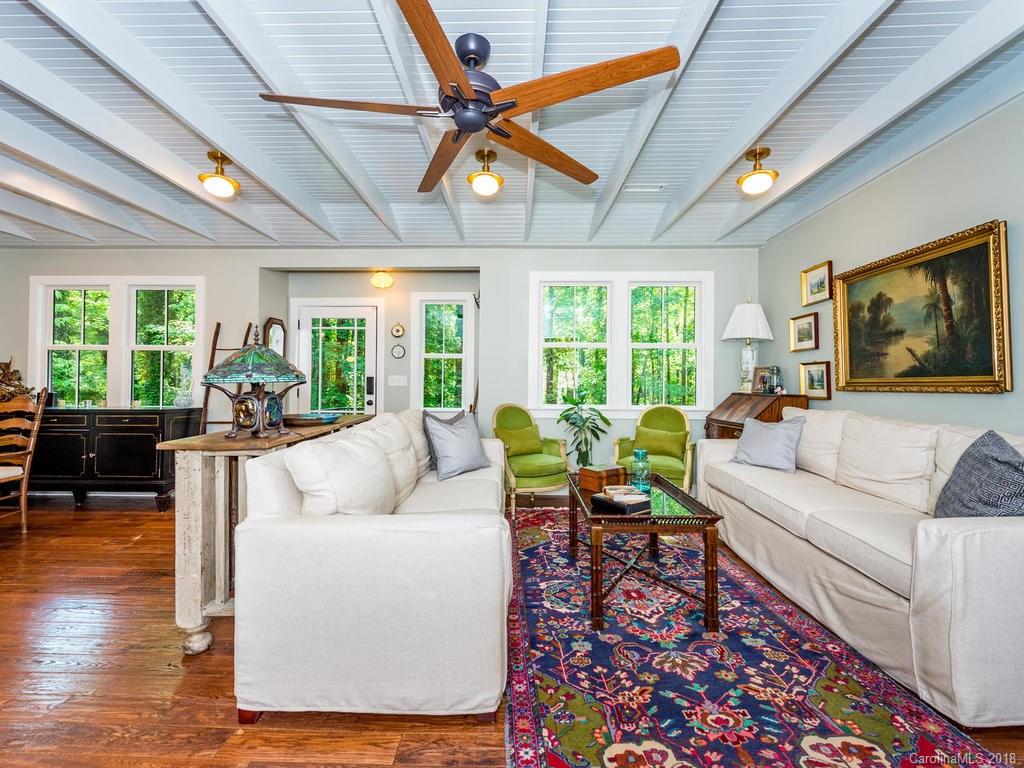190 Euit Smith Road Tryon, NC 28782 - Photo 3 of 36 a living room with furniture and a large window