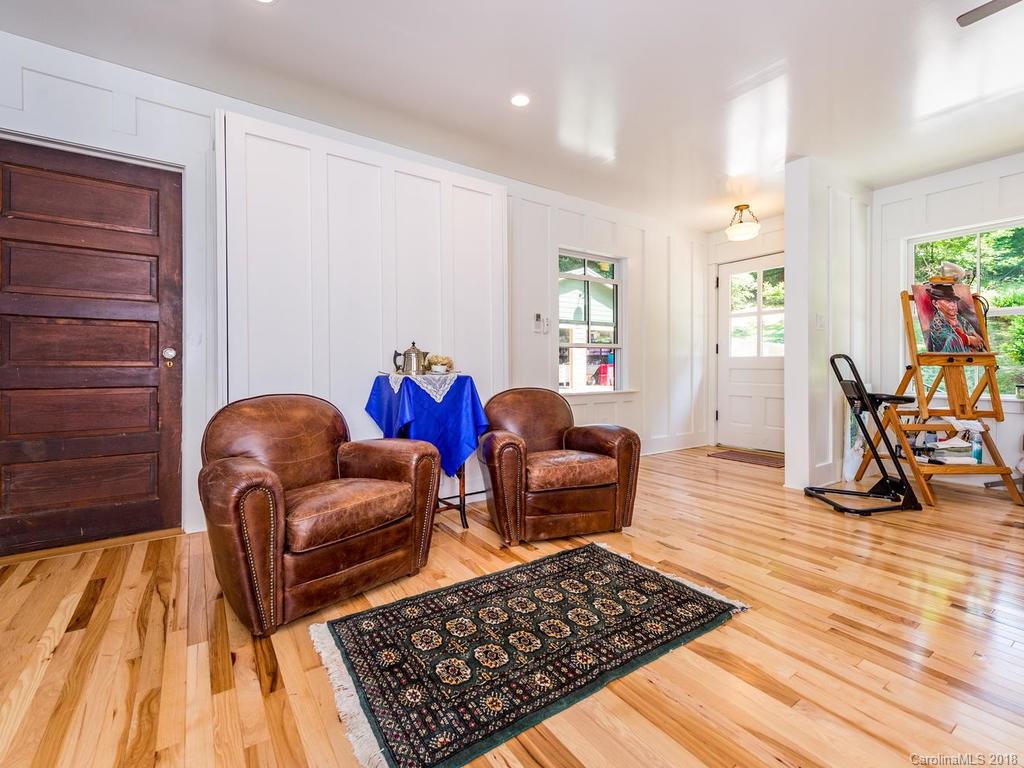 190 Euit Smith Road Tryon, NC 28782 - Photo 25 of 36 a living room with furniture rug and window