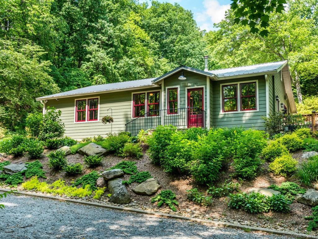 190 Euit Smith Road Tryon, NC 28782 - Photo 35 of 36 a front view of house with yard and green space
