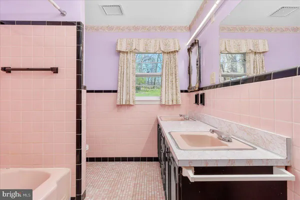 a bathroom with a bathtub
