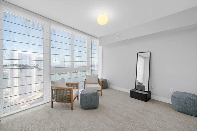 a room with a couch and a window