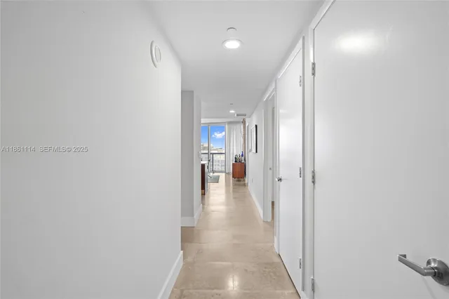 a view of a hallway with a workspace
