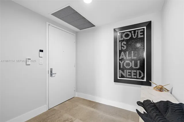 a view of a balcony with yard