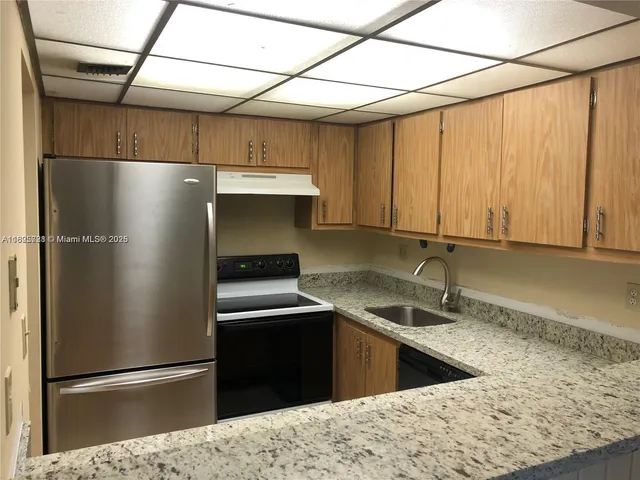 a swimming pool with outdoor seating and yard