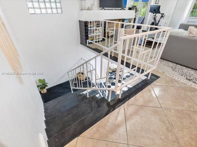 600 Surfside Boulevard Surfside, FL 33154 - Photo 19 of 31 a view of entryway and hall with wooden floor