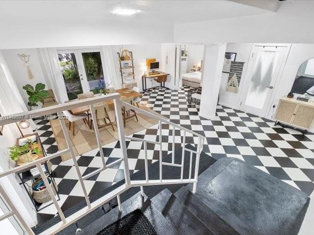 600 Surfside Boulevard Surfside, FL 33154 - Photo 21 of 31 a living room with a black white checkered floor with a black white checkered floor