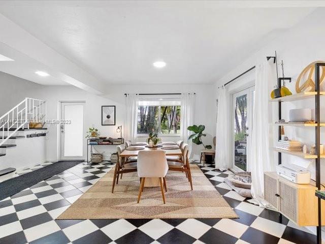 600 Surfside Boulevard Surfside, FL 33154 - Photo 5 of 31 a living room with furniture and a rug