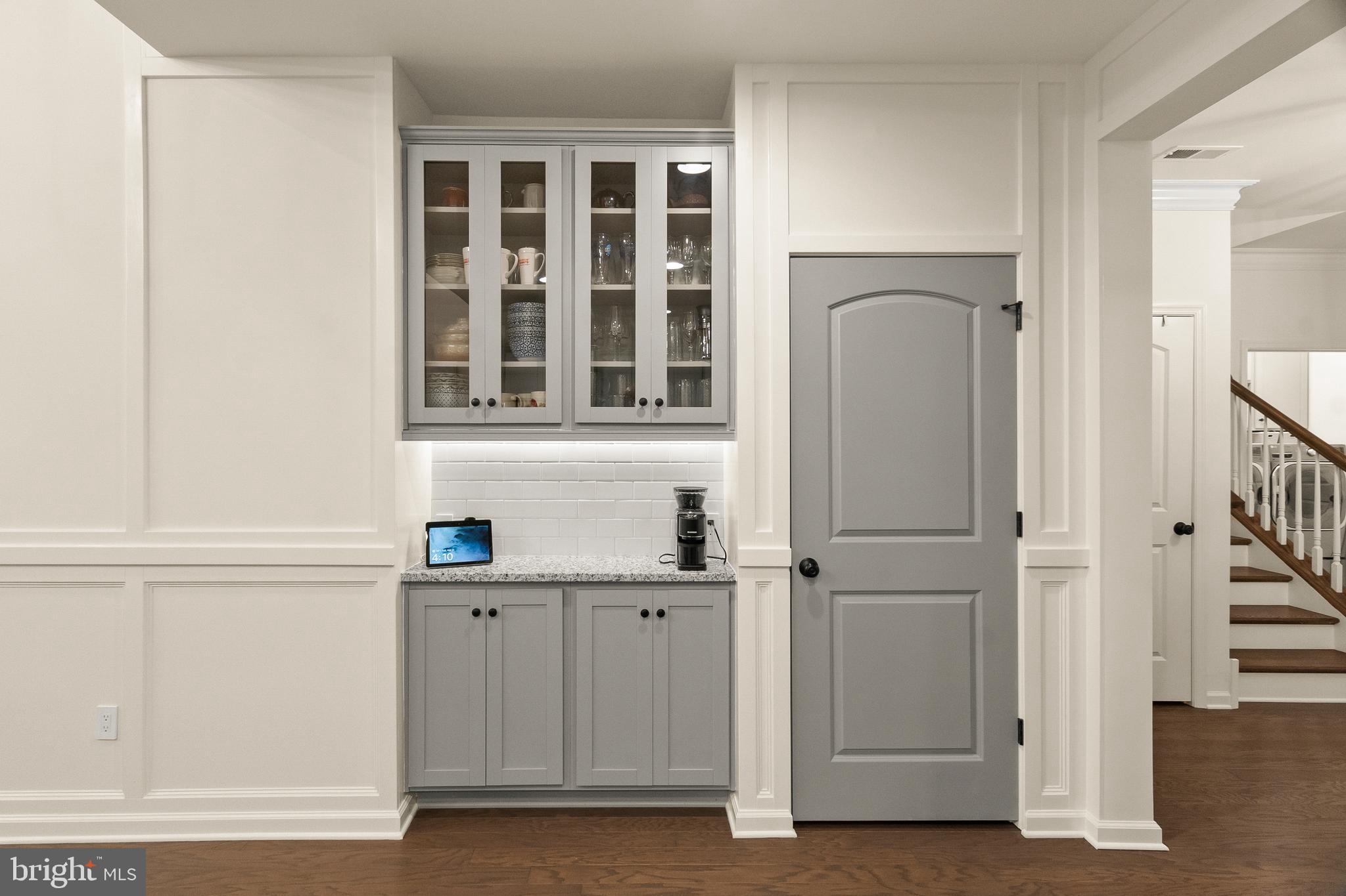407 Sun Boulevard Bear, DE 19701 - Photo 20 of 69 a view of cabinets with entryway