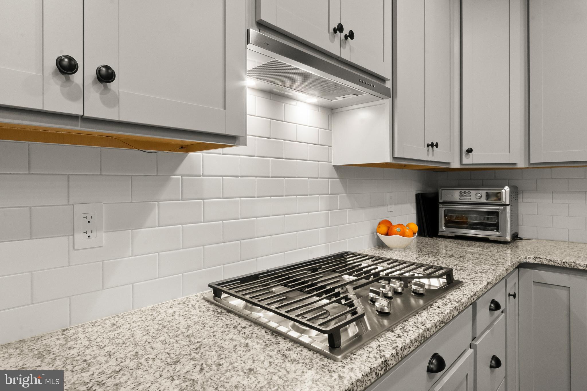 407 Sun Boulevard Bear, DE 19701 - Photo 21 of 69 a stove top oven sitting inside of a kitchen