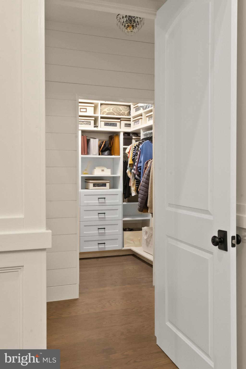 407 Sun Boulevard Bear, DE 19701 - Photo 31 of 69 a view of walk in closet with clothes