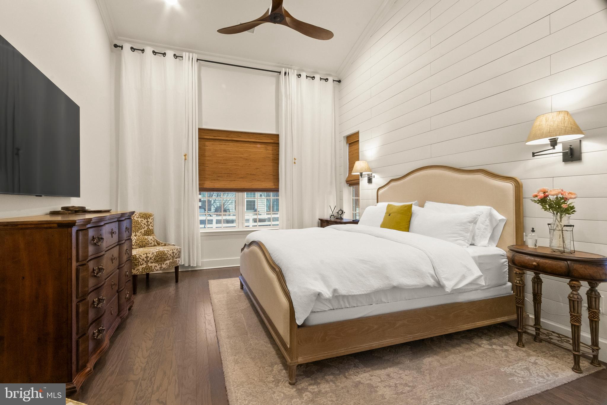 407 Sun Boulevard Bear, DE 19701 - Photo 32 of 69 a bedroom with a bed and a flat tv screen on dresser