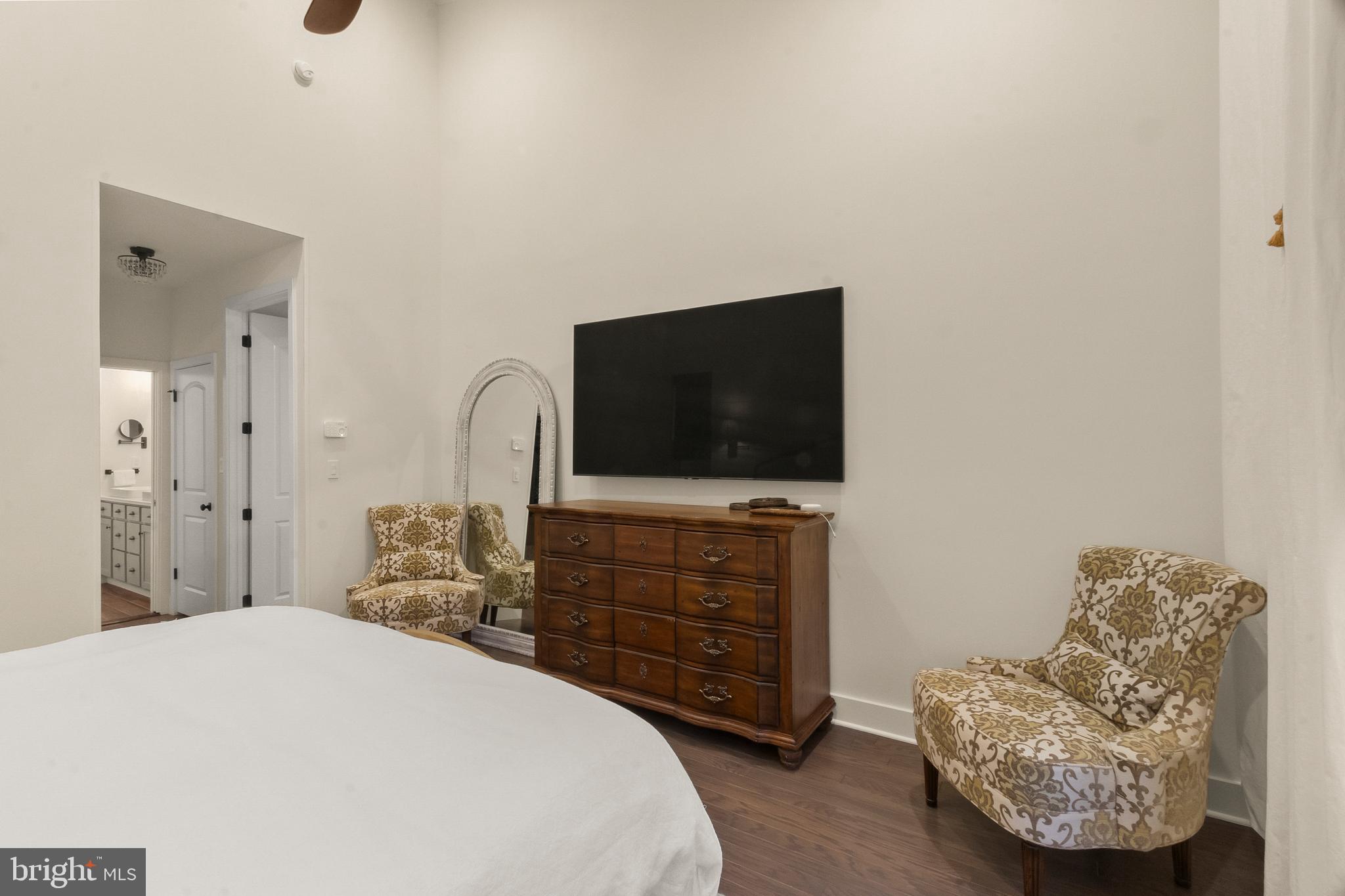 407 Sun Boulevard Bear, DE 19701 - Photo 34 of 69 a bedroom with a bed and a television