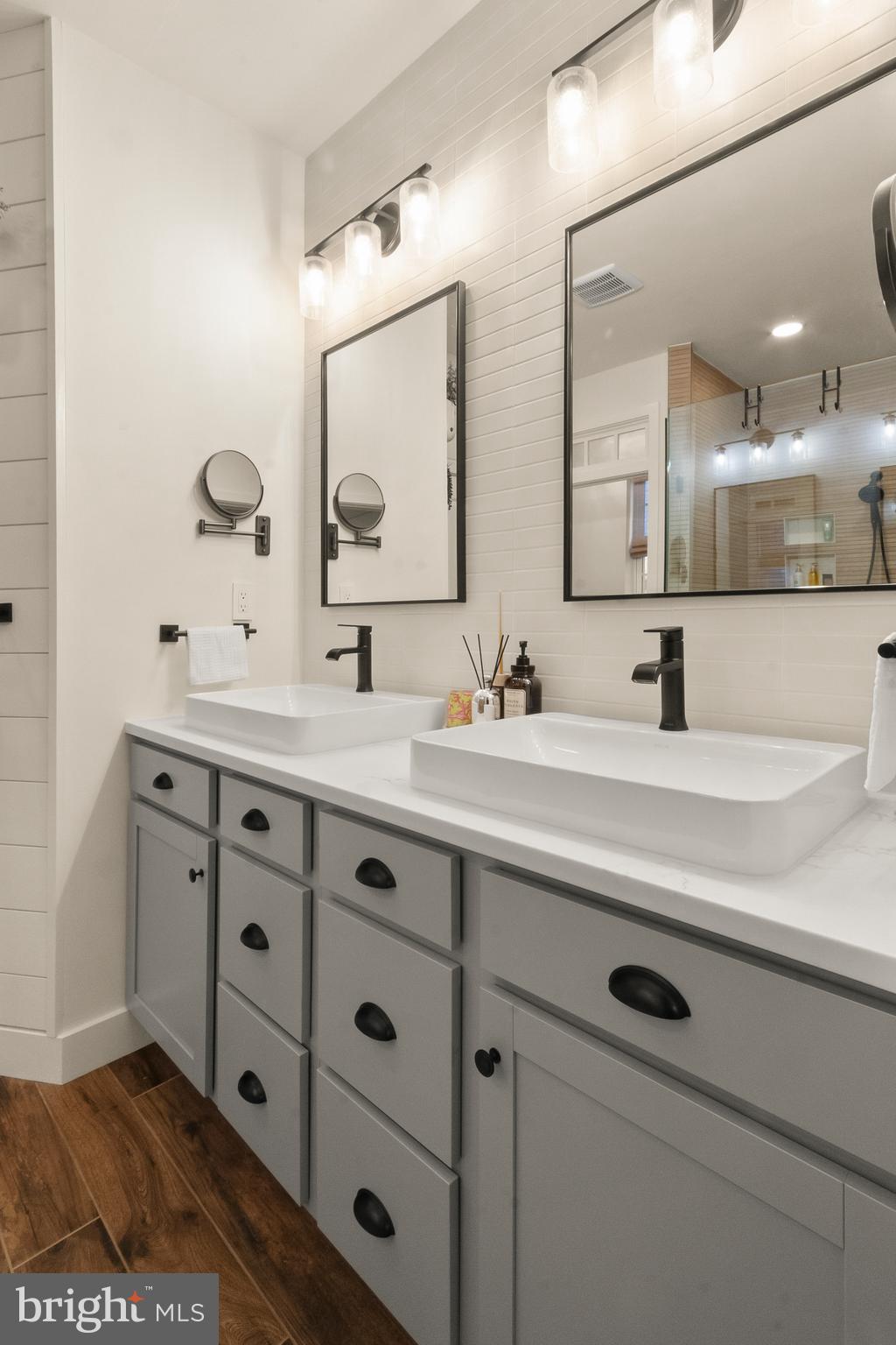 407 Sun Boulevard Bear, DE 19701 - Photo 38 of 69 a bathroom with a double vanity sink mirror and