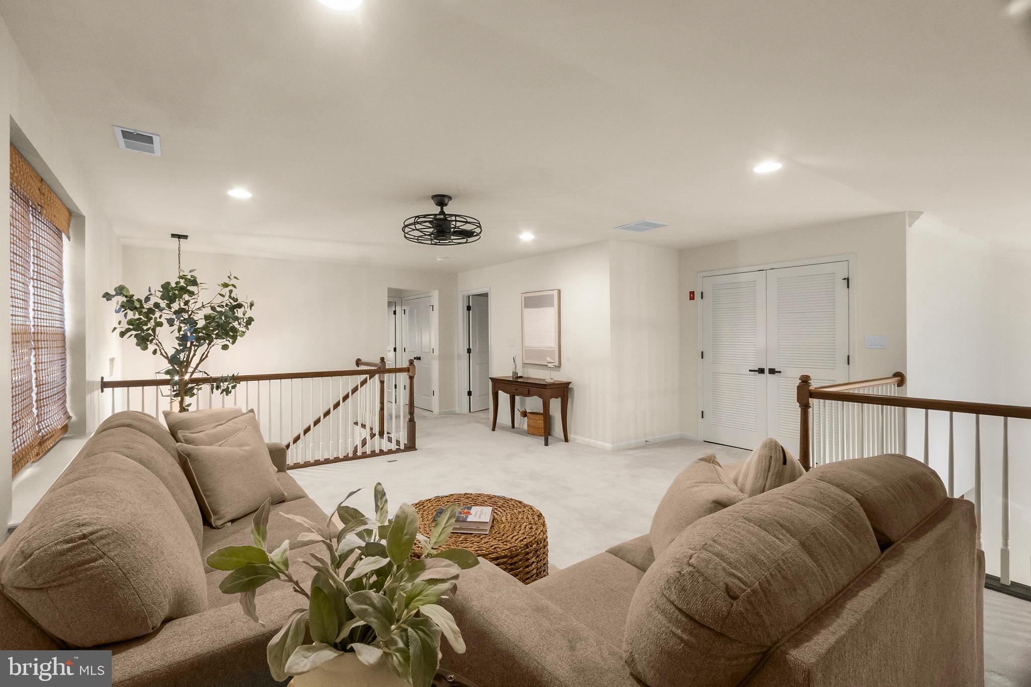 407 Sun Boulevard Bear, DE 19701 - Photo 47 of 69 a living room with furniture and wooden floor