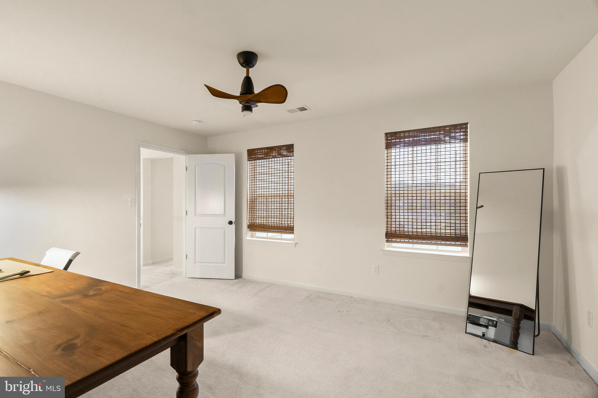 407 Sun Boulevard Bear, DE 19701 - Photo 49 of 69 a view of livingroom with hardwood floor and a ceiling fan