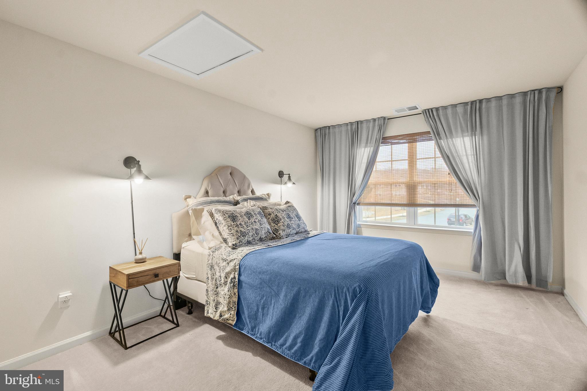 407 Sun Boulevard Bear, DE 19701 - Photo 53 of 69 a bedroom with a bed and a window