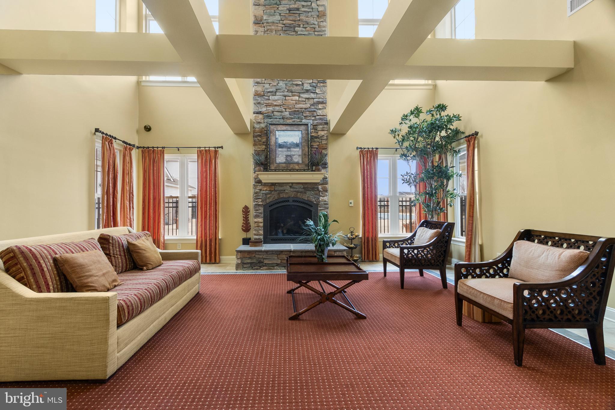 407 Sun Boulevard Bear, DE 19701 - Photo 56 of 69 a living room with furniture and a fireplace