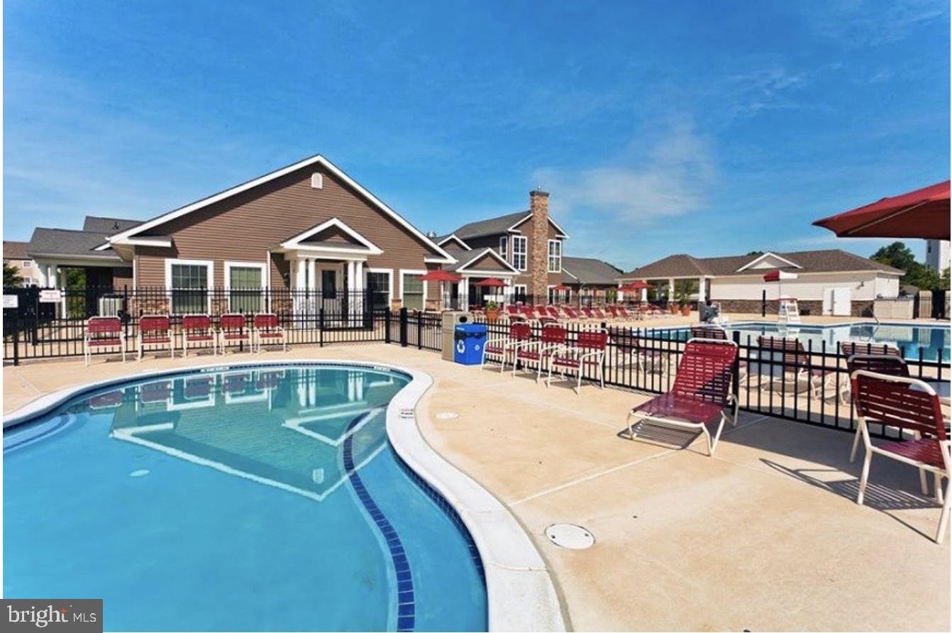 407 Sun Boulevard Bear, DE 19701 - Photo 69 of 69 a view of a house with a swimming pool