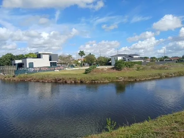 a view of a lake with houses