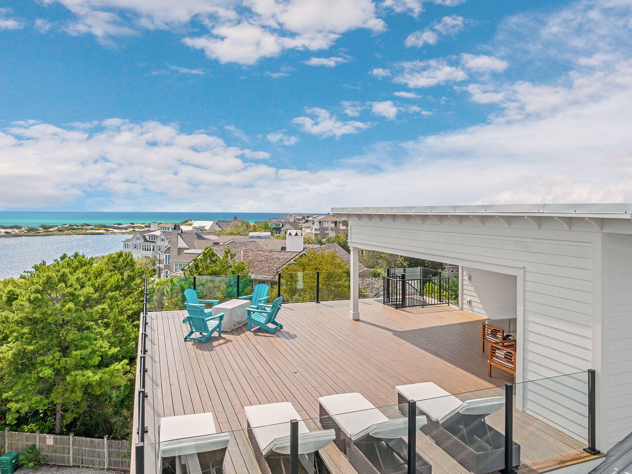 7570 East County Highway 30A Watersound, FL 32461 - Photo 11 of 64 a view of a balcony with furniture